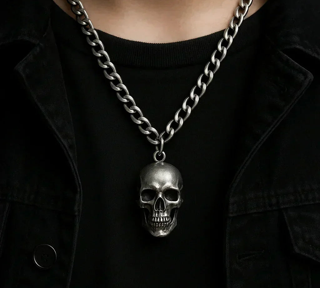 A man wearing skull necklace which really means in fashion styling.