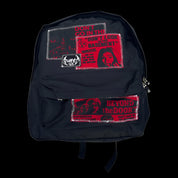 A full-frontal view of a black PT269 Dead Control Backpack is shown, featuring stitched red and black horror movie poster patches.