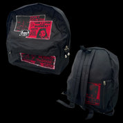 A PT269 Dead Control Backpack is displayed in two views, one showing the front with horror movie poster patches, and the other showing the back and a small side patch, both against a dark background.