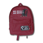 A PT269 No Mercy Rivet Backpack is shown against a white background, featuring a red fabric with "NO MERCY NO MERCY" text, a screaming woman graphic, and a patch with a man's face and "PUPPET269 SINCE 2020 NOMERCY".