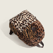 Leopard Print Plush Backpack with a white background.