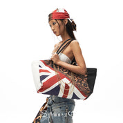 a woman carrying tote bag leopard print  in a fierce way.