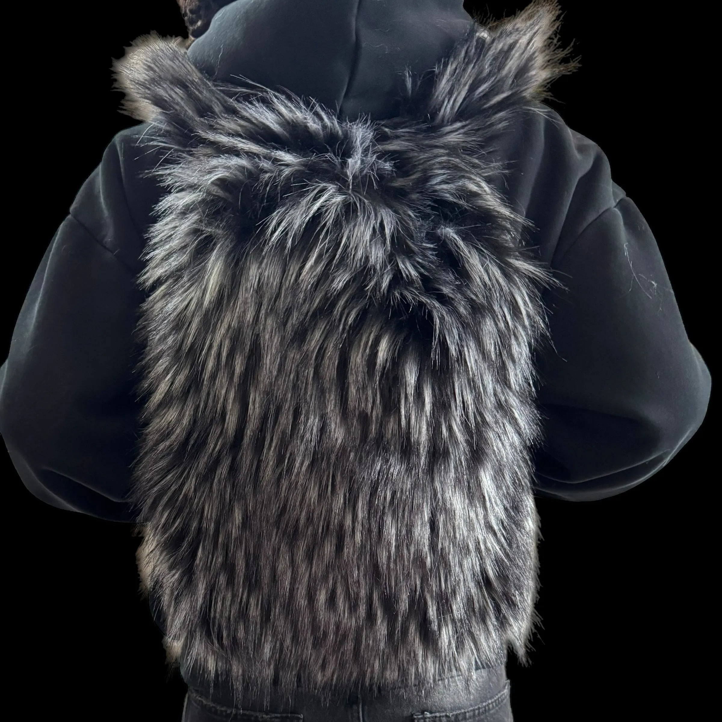 A fluffy dark grey Plush Backpacks - Lost Series with bunny ears are shown on a person's back in two separate images, highlighting their playful designs.