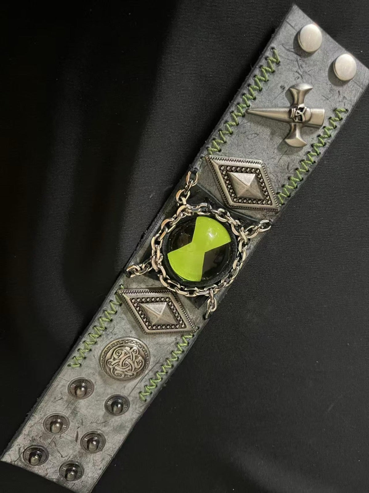 ben 10 omnitrix in a vertical side ways angle.