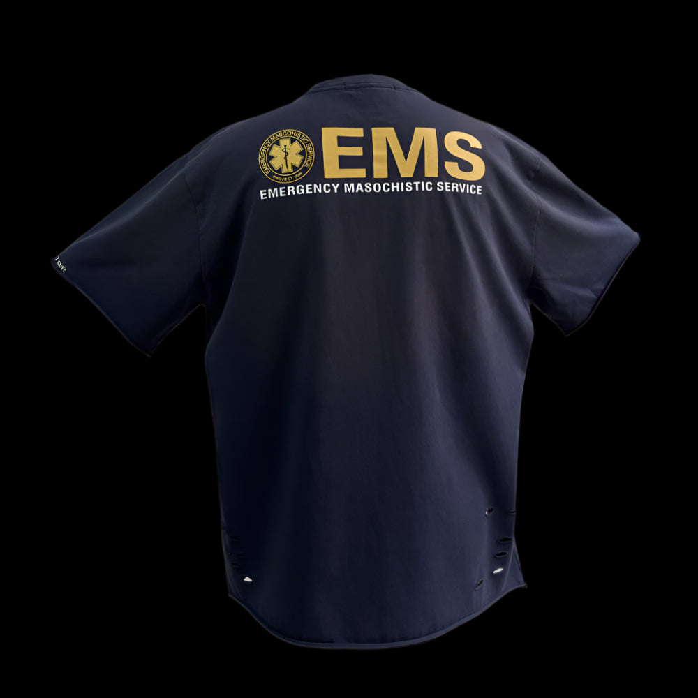 The back of a dark blue "Masochist T-Shirt" with gold "EMS" and "EMERGENCY MASOCHISTIC SERVICE" text, and a circular emblem.