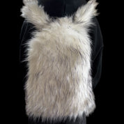 A luxurious white and grey fluffy Plush Backpacks - Lost Series is worn on a person's back, set against a dark background, perfectly blending playful design.