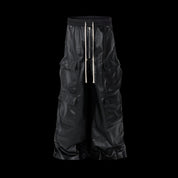 Durable "Men" Genuine Leather Pants featuring a detailed shot of black, wide-leg cargo pants with a slightly shiny, waxed leather appearance.
