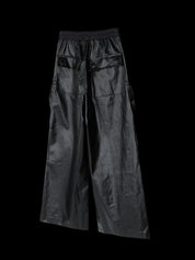 Stylish "Men" RO Waxed Black Cargos Pants as dark, textured cargo pants with a wide leg, drawstring waist, and various utility pockets.
