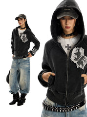 "Punk RockStar" hoodie with graphic patches and ripped detailing.