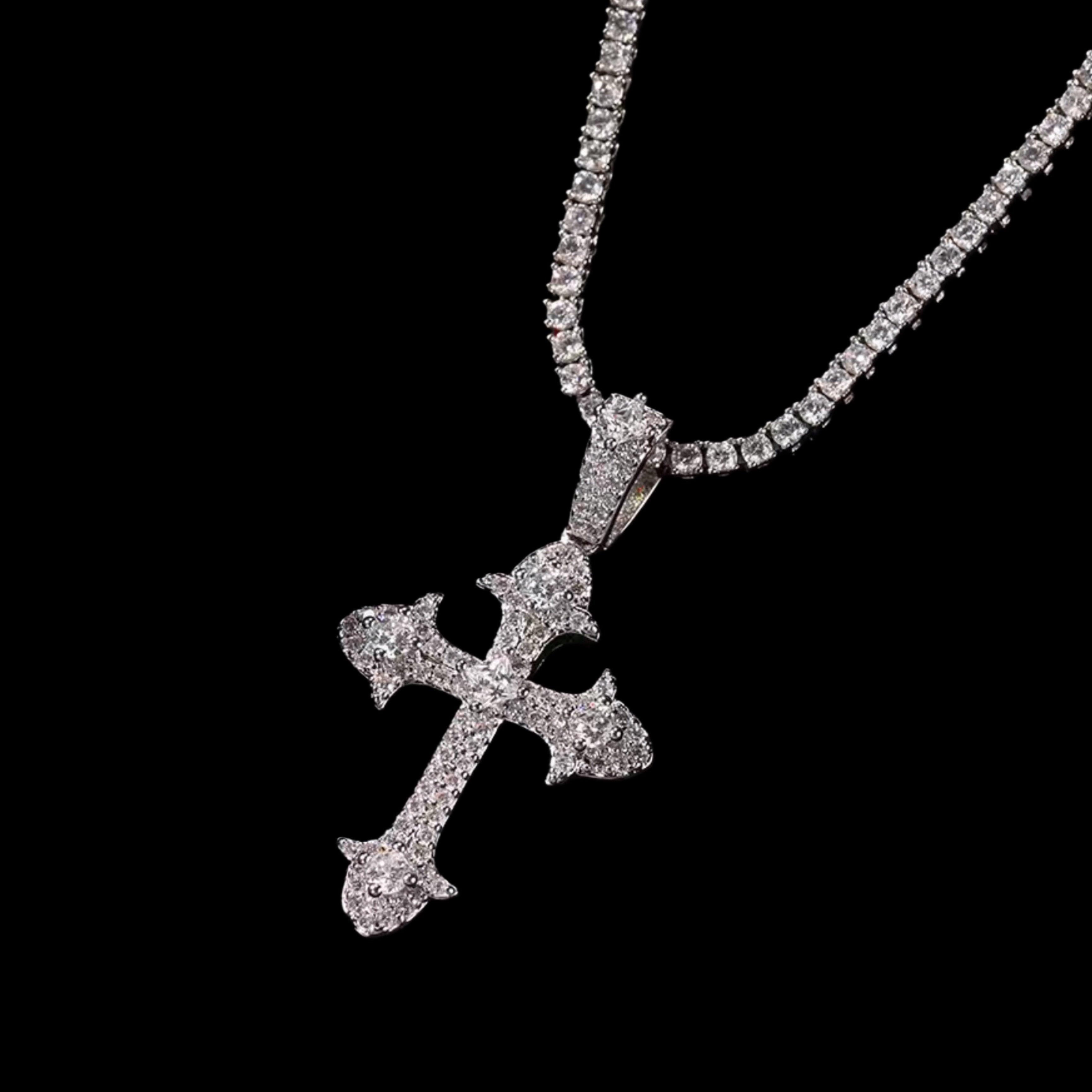 A shimmering MICRO DIAMOND CROSS NECKLACE, featuring a fully encrusted cross pendant on a thin diamond chain, is displayed against a dark background.