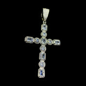 A  dazzling "GODFATHER CROSS NECKLACE" pendant, featuring a cross adorned with various cuts of sparkling diamonds, hangs against a deep black background.