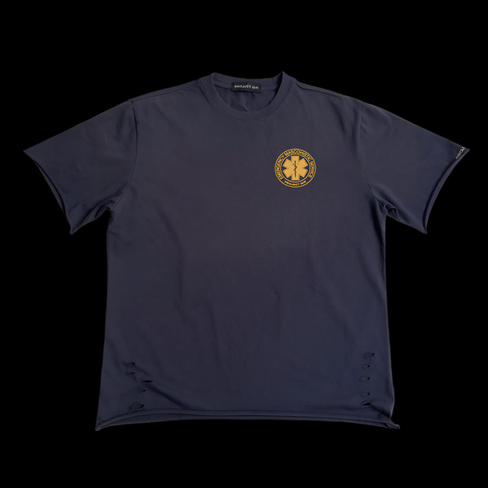 A dark blue "Masochist DIVISION TEE" featuring a gold circular emblem with a star of life symbol and text on the front.