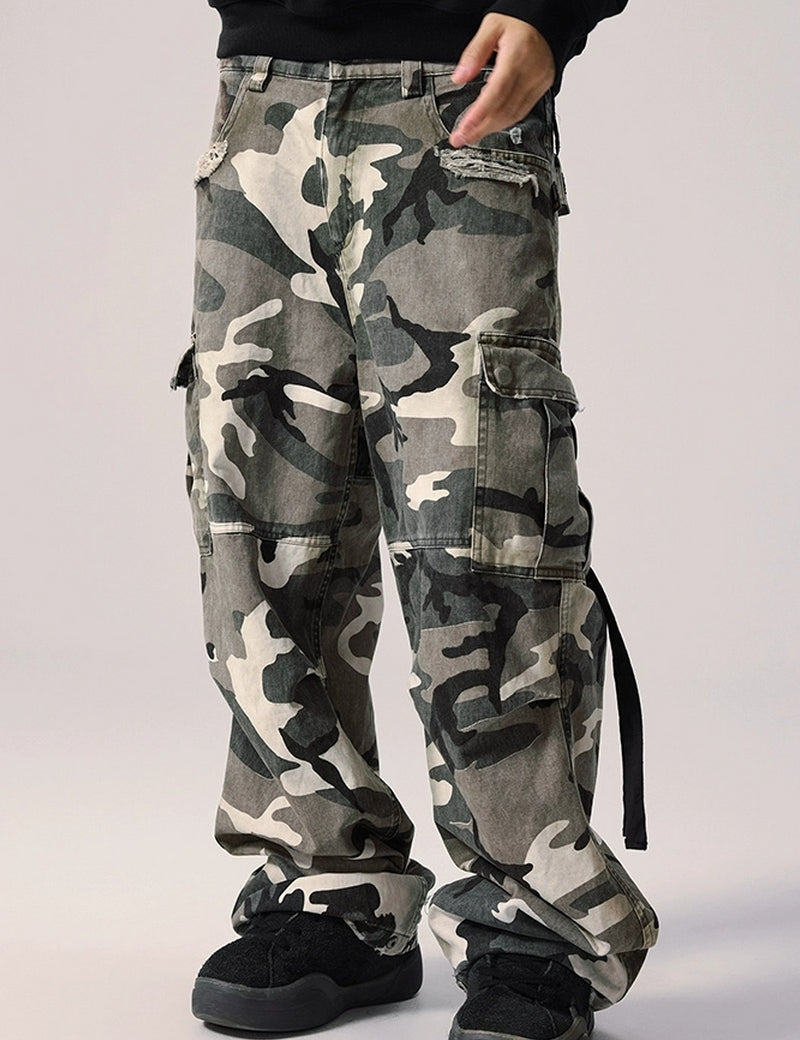 A man wearing Vintage Camouflage Cargo Pants.