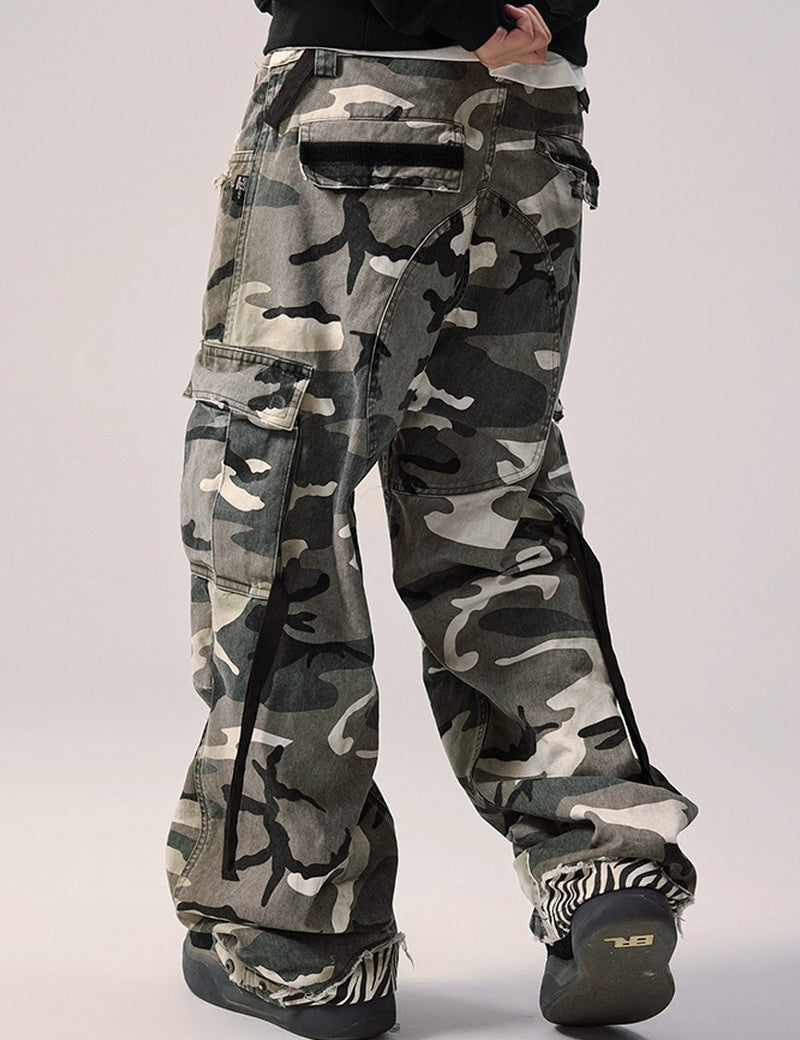 A man with Vintage Camouflage Cargo Pants.