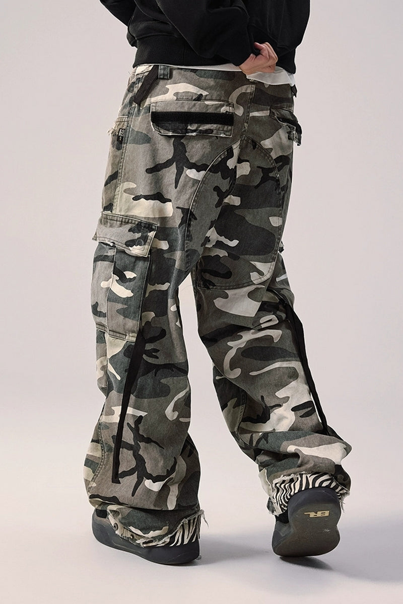 A man with Vintage Camouflage Cargo Pants.