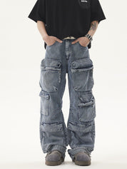 A person wears a black t-shirt and light blue, acid-wash Heavy duty Vibe Cargo Jeans with multiple large pockets, paired with grey platform sneakers.