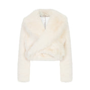 Folded ladies white fur coat.