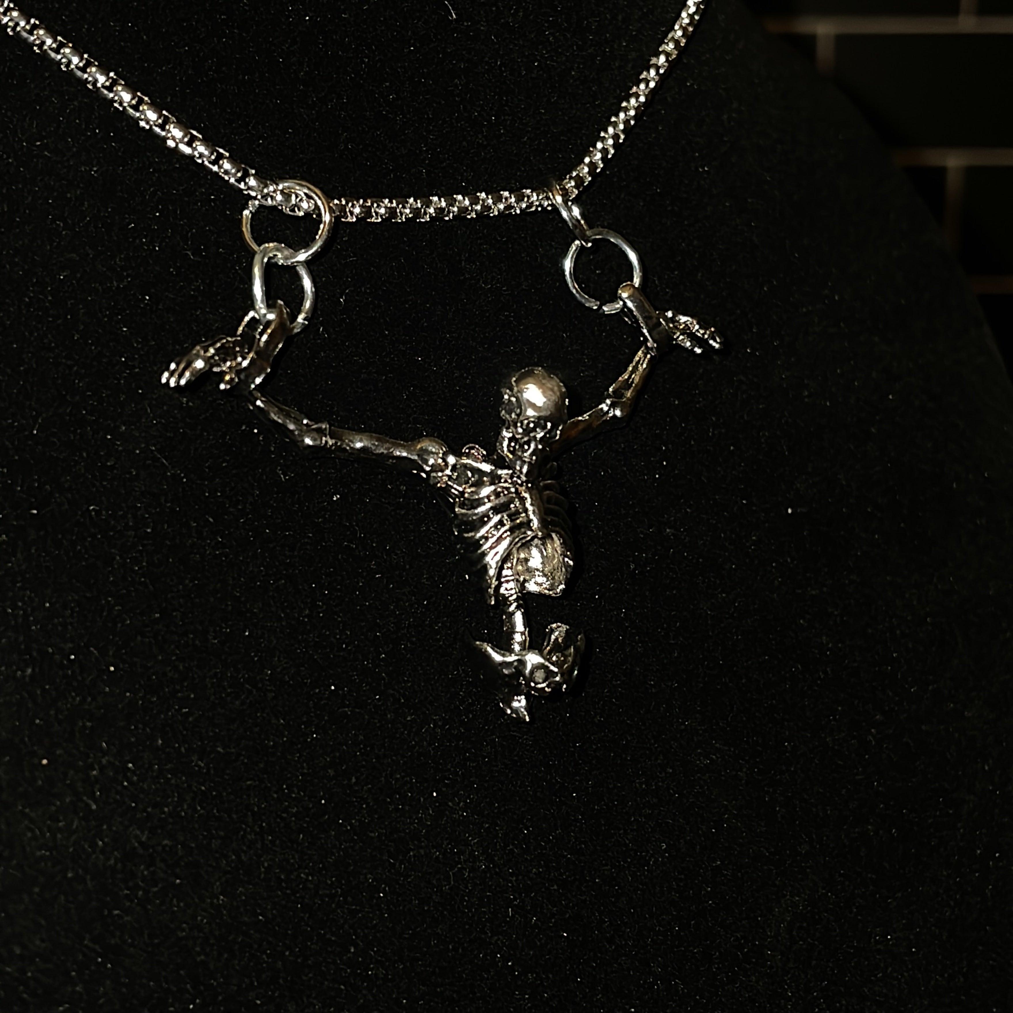 "Crucified Skeleton Necklace"