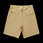A khaki-colored pair of Remedy Straight Workwear Mid-Length Jorts is shown on a mannequin, while another image shows a person modeling the black version of the shorts, paired with a gray T-shirt and sneakers.