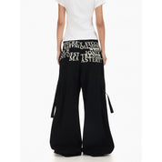 Retro Slogan Multi - Pocket Pants - Dekayed